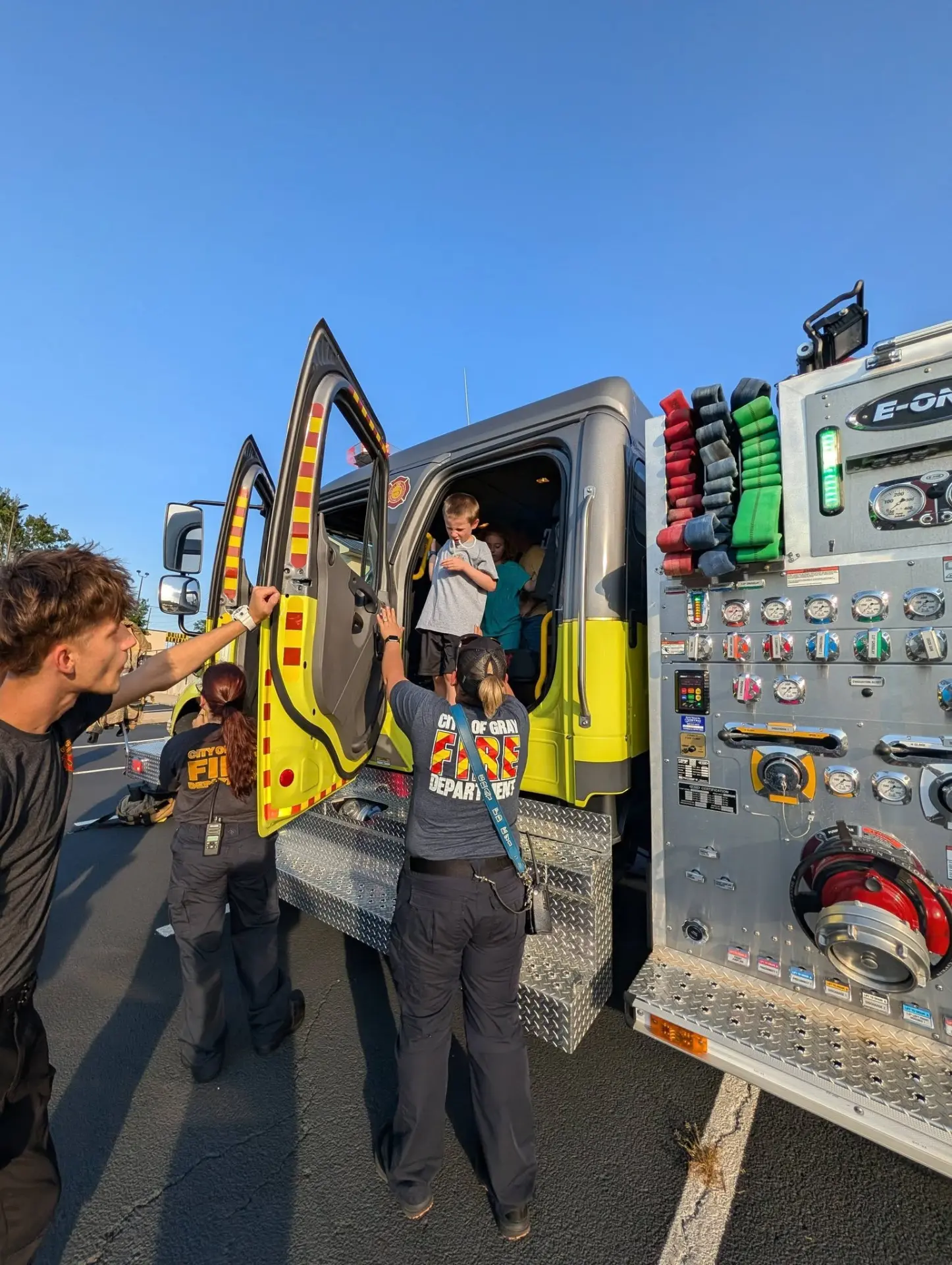 The crew showed the kids every gauge, hose and button.